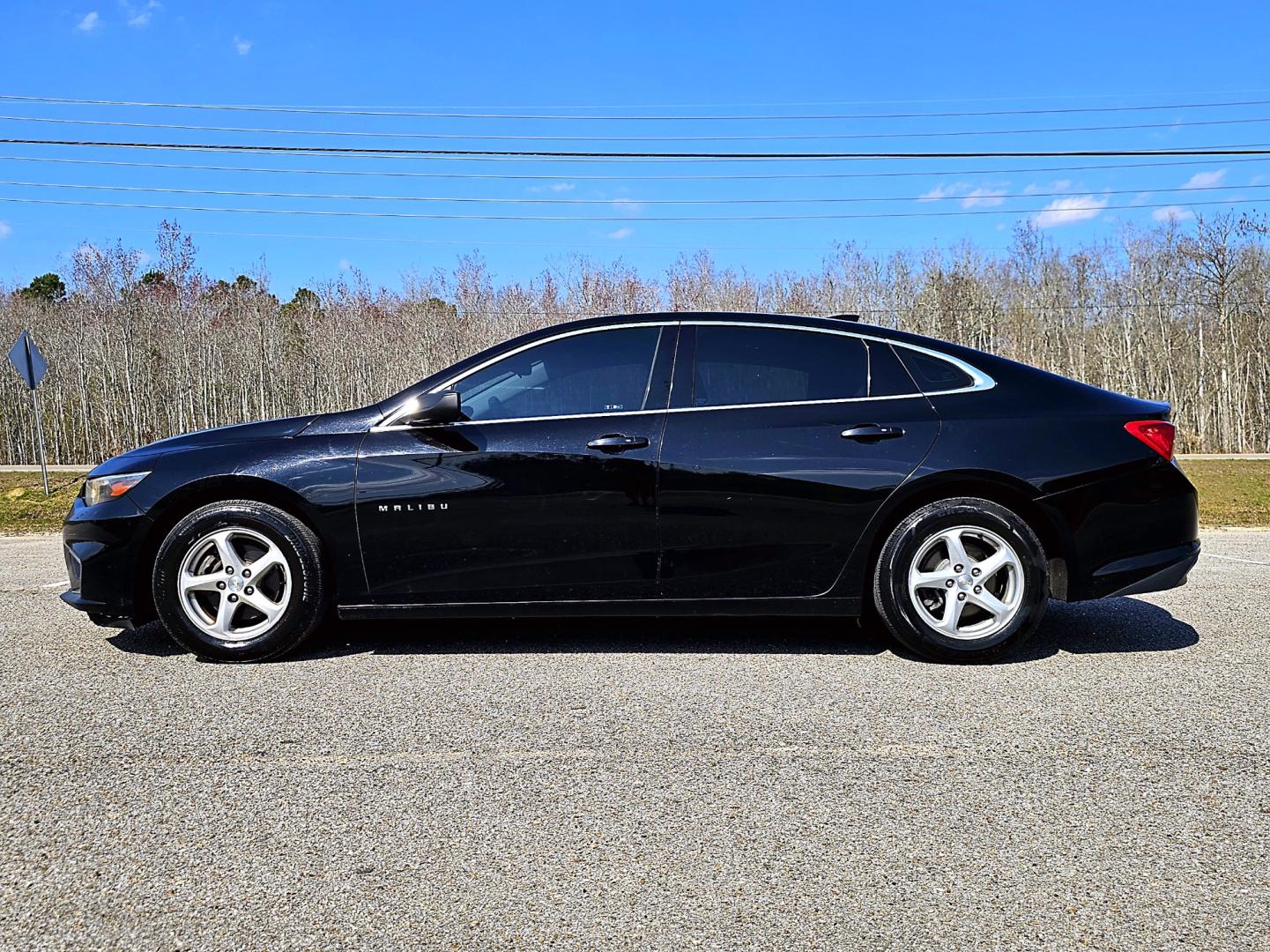 2016 Black Chevrolet Malibu LS (1G1ZB5ST4GF) with an 1.5L L4 DOHC 16V engine, 6A transmission, located at 18001 Kellogg Rd, Saucier, MS, 39574, (228) 832-1441, 139.421463, -76.641457 - Photo#4